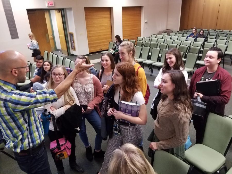 Mike Simons, left, chats with student journalists after delivering his Keynote session at the Garden State Scholastic Press Association's Fall Press Day on Oct. 28, 2019 at Rutgers University's Busch Campus Center.